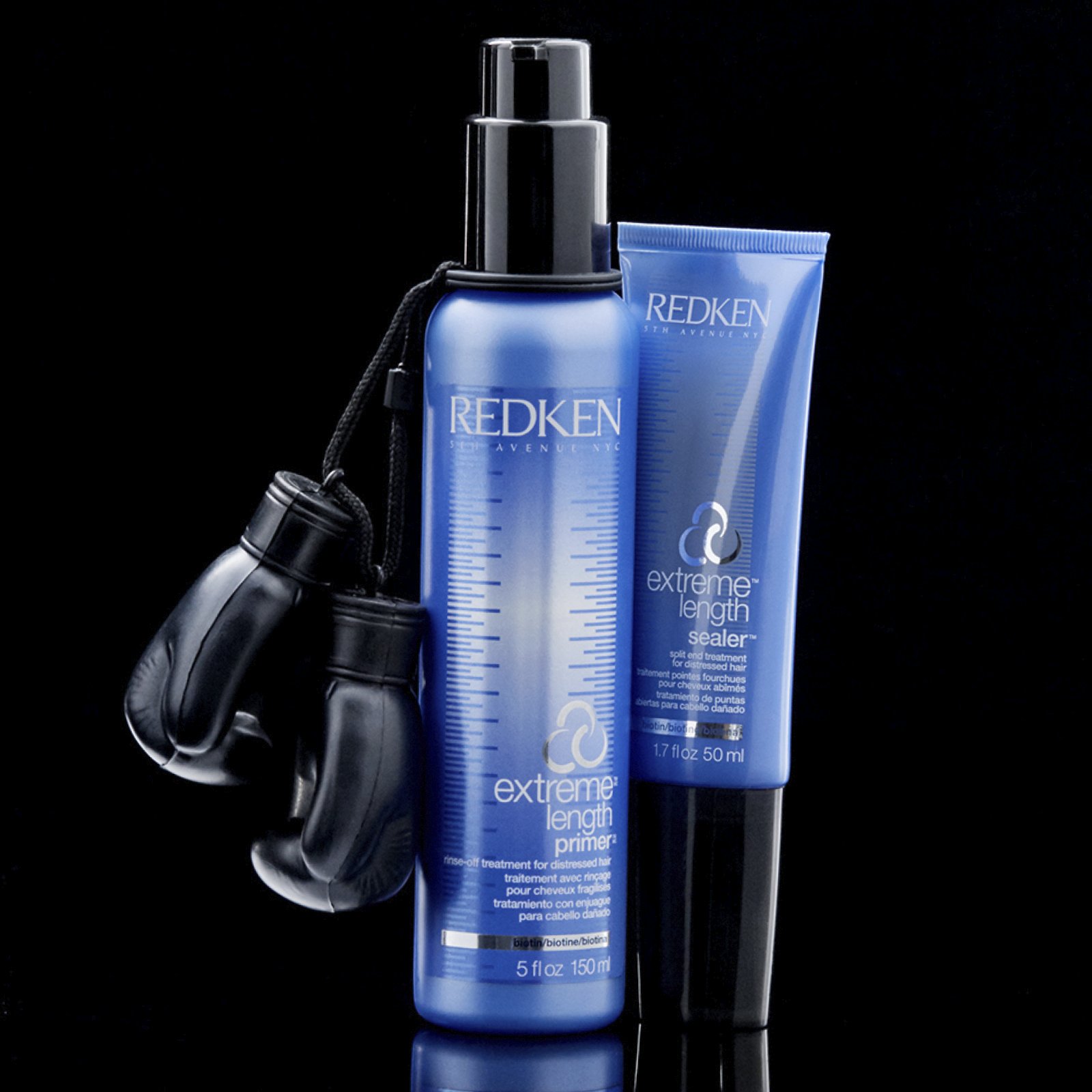 Redken Extreme Primer next to Extreme Split End Sealer and boxing glove. 